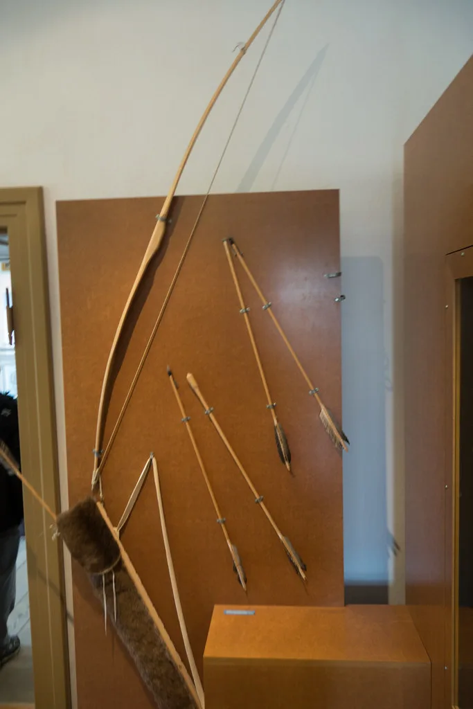 Close-up of a composite bow limb showing layered horn, wood, and sinew
