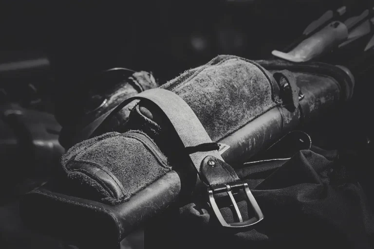 Fuse Quiver on a compound bow beside a bowhunter in a dawn forest